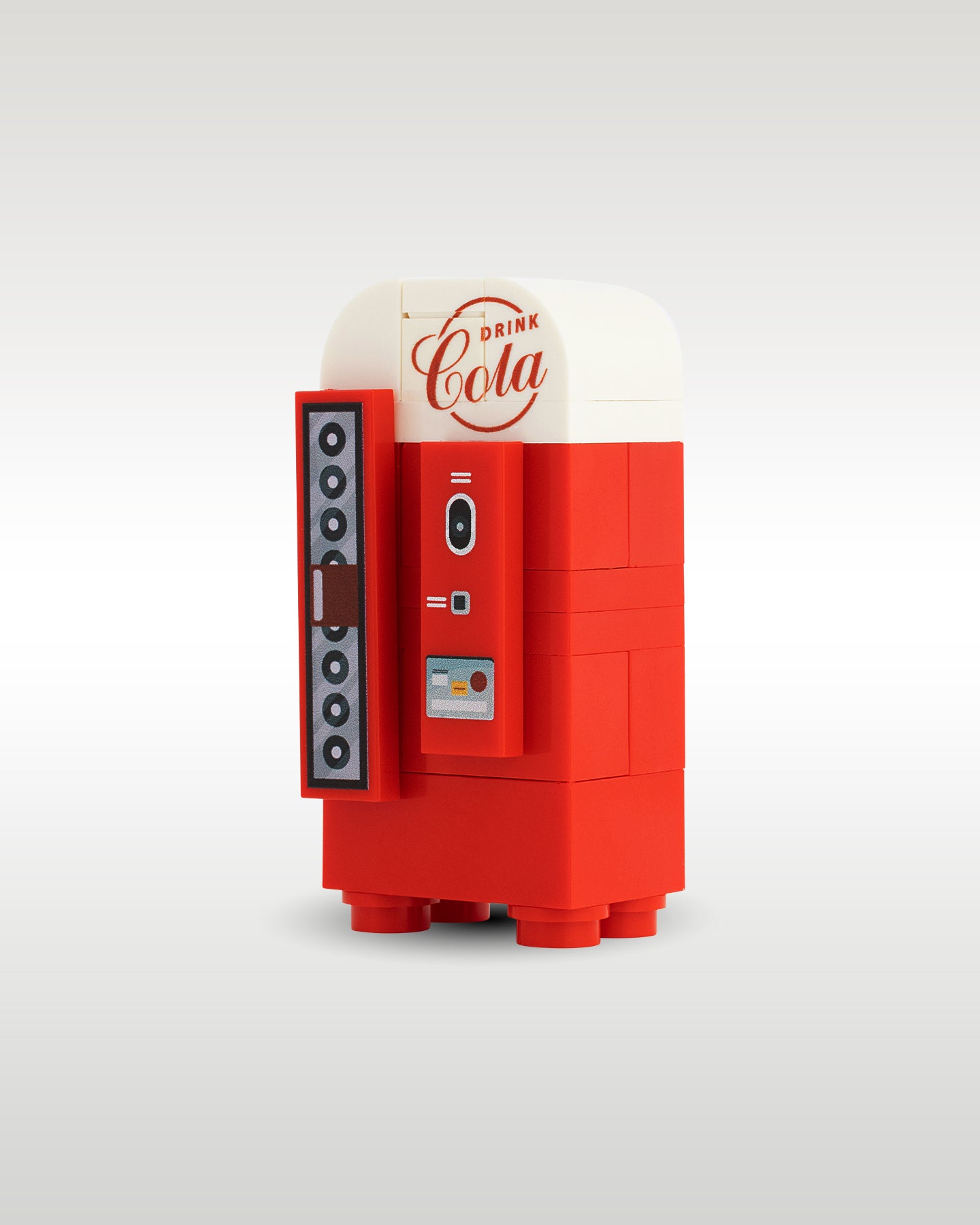 Side perspective view of the Trader Bricks custom MOC 1950s-style soda dispenser machine, highlighting the compact modular build scale designed to accent custom brick city scenes