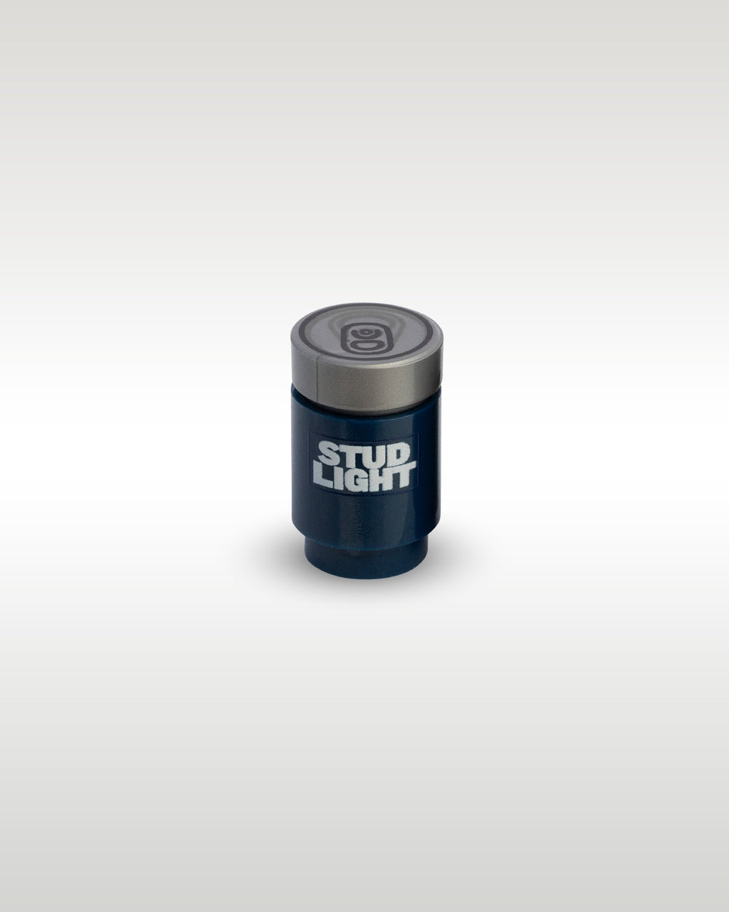 High-angle perspective of the dark blue Stud Light custom toy brick can by Trader Bricks, showcasing the detailed silver pull-tab printed top lid