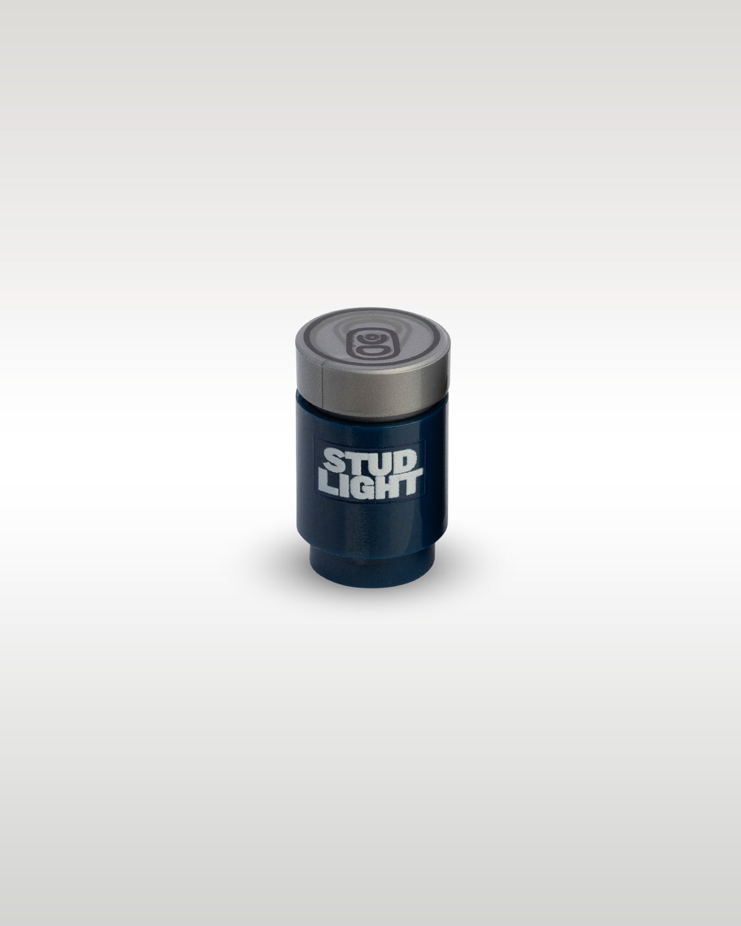 High-angle perspective of the dark blue Stud Light custom toy brick can by Trader Bricks, showcasing the detailed silver pull-tab printed top lid