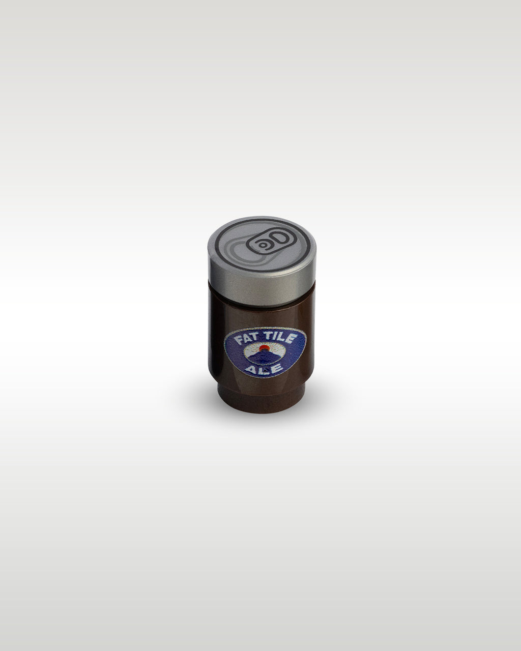 High-angle perspective of the brown Fat Tile Ale custom toy brick beer can by Trader Bricks, highlighting the detailed silver pull-tab printed lid