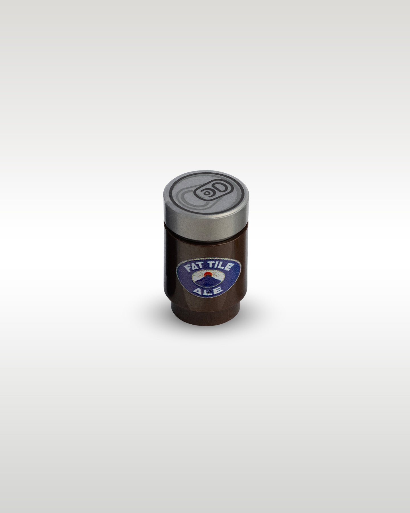 High-angle perspective of the brown Fat Tile Ale custom toy brick beer can by Trader Bricks, highlighting the detailed silver pull-tab printed lid