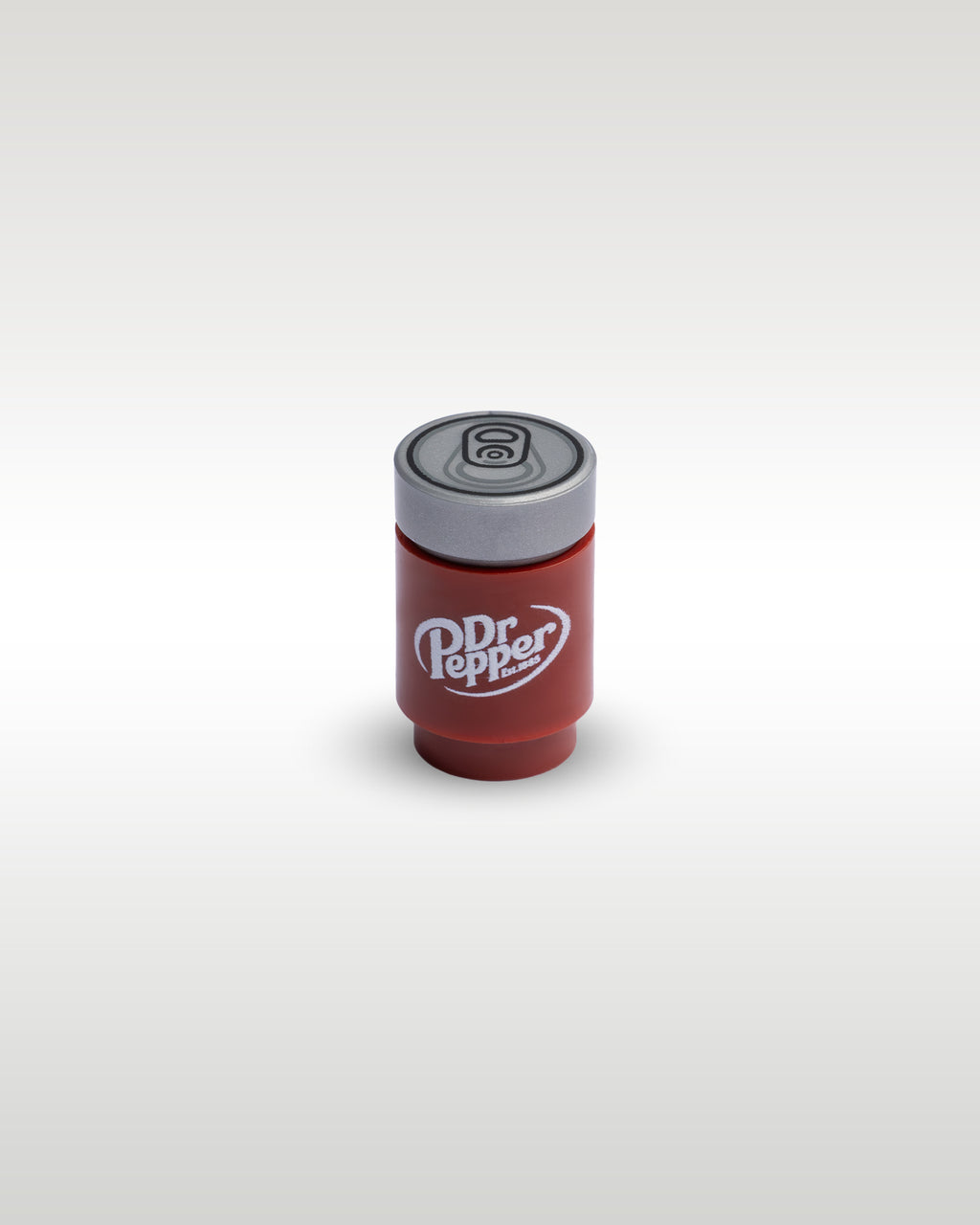 High-angle perspective of the dark red Dr Pepper custom toy brick can by Trader Bricks, highlighting the detailed silver printed pull-tab lid
