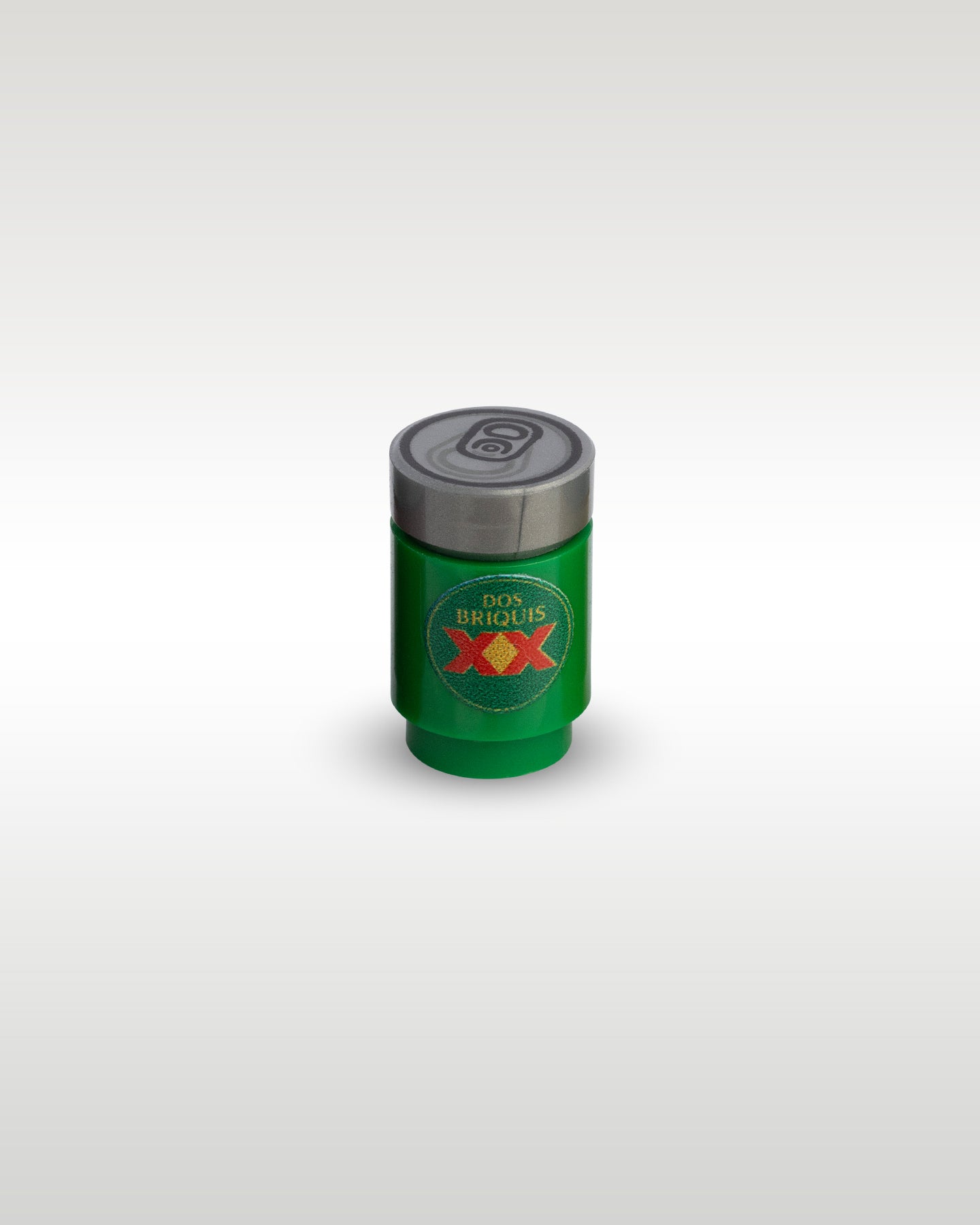 High-angle perspective of the green Dos Briquis custom toy brick can by Trader Bricks, showing the detailed silver pull-tab printed top lid