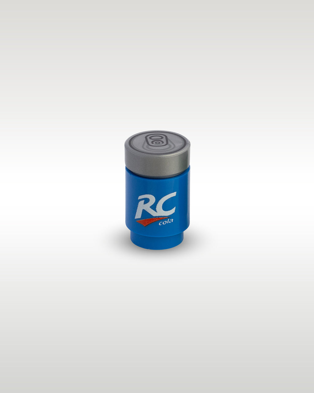 High-angle perspective of the blue RC Cola custom toy brick can by Trader Bricks, highlighting the detailed silver soda can pull-tab printed top lid
