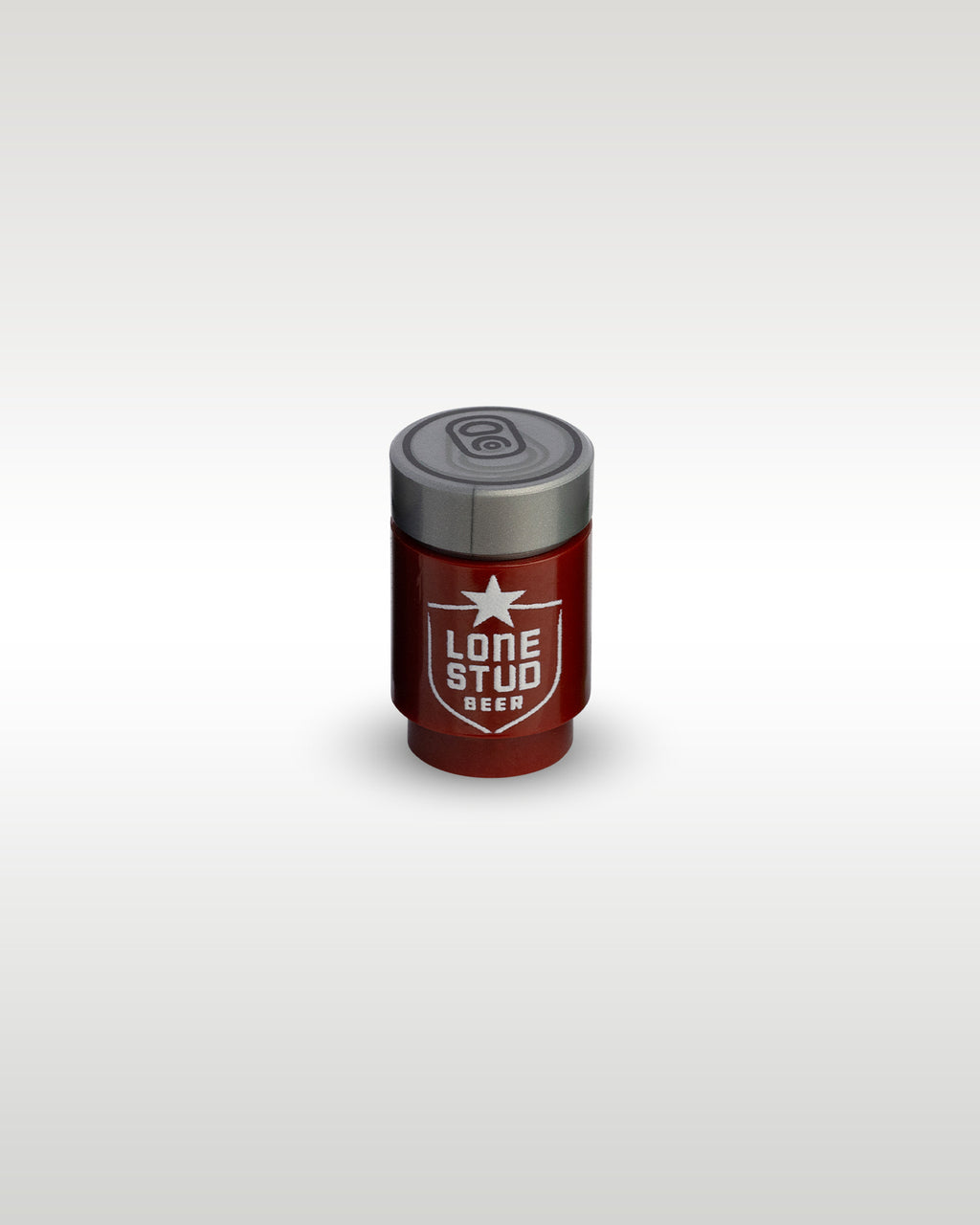 High-angle perspective of the red Lone Stud custom toy brick can by Trader Bricks, showcasing the realistic silver pull-tab printed top lid