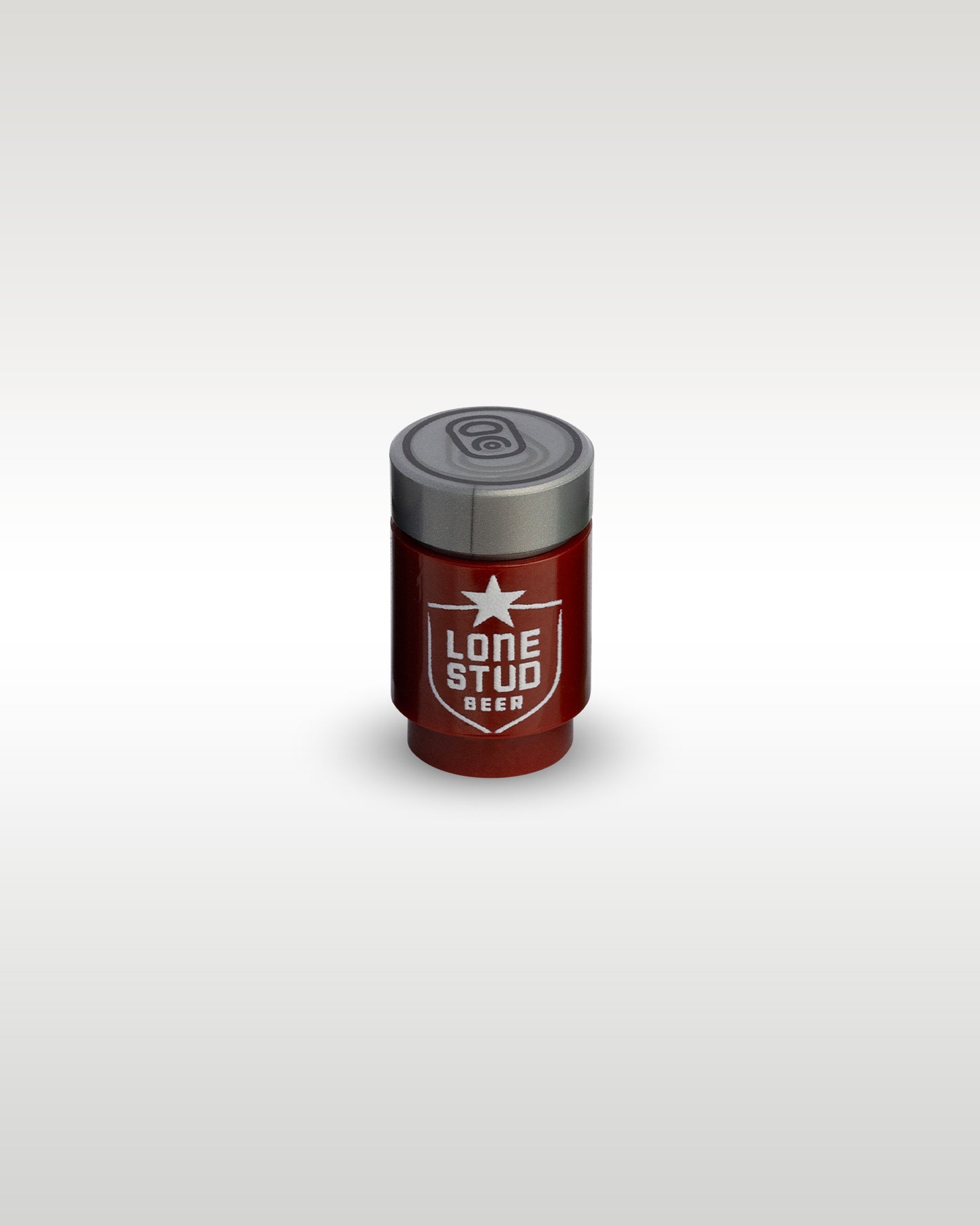 High-angle perspective of the red Lone Stud custom toy brick can by Trader Bricks, showcasing the realistic silver pull-tab printed top lid