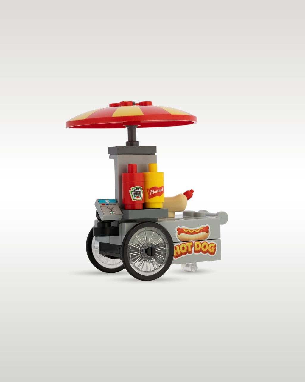 Rear perspective of the modular city street hot dog cart build, showcasing the compact scale designed to fit standard brick city sidewalks and boardwalk layouts