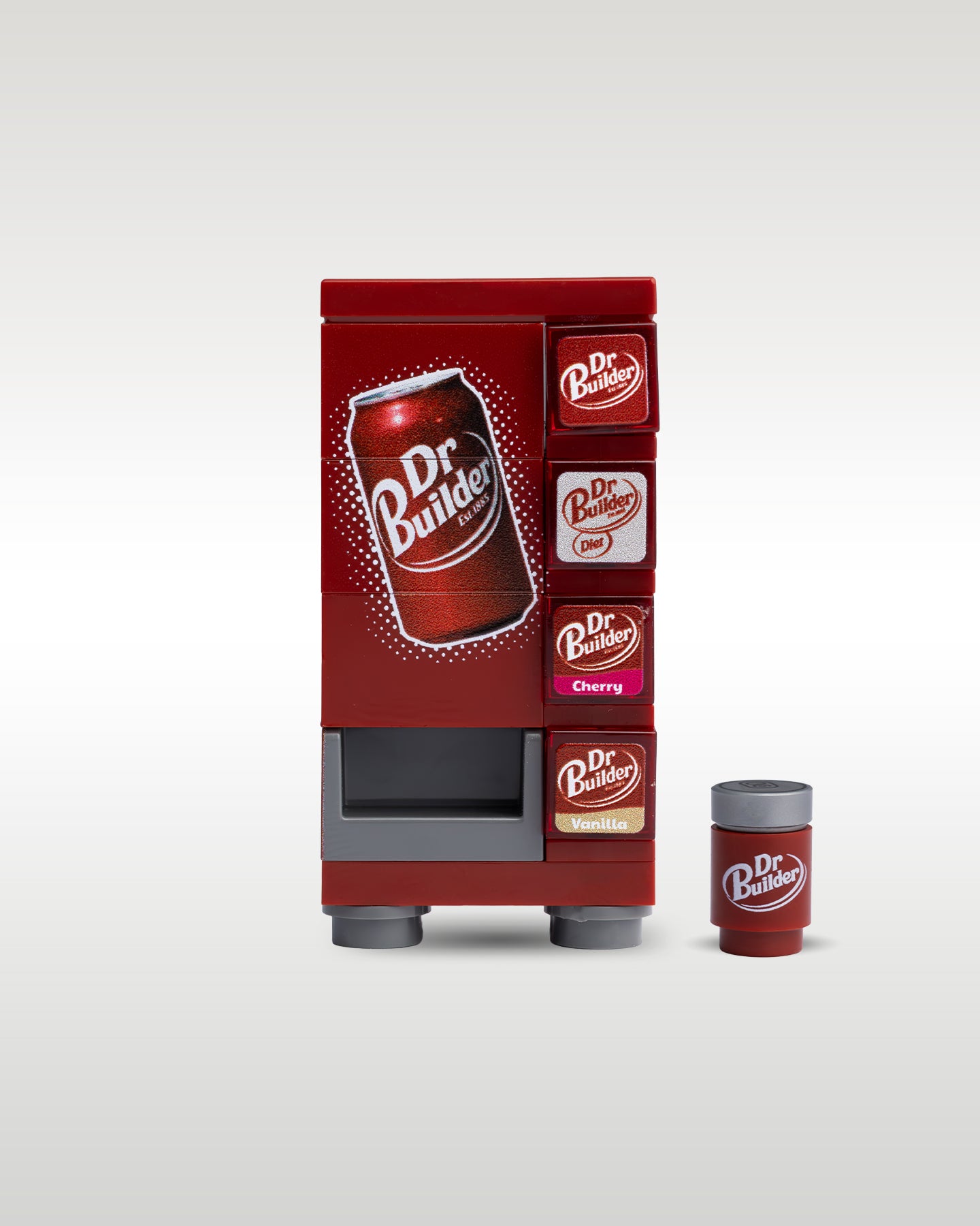 Custom brick-built Dr. Builder soda vending machine MOC set by Trader Bricks, featuring a maroon soda can graphic panel and a matching miniature dark red soda can accessory