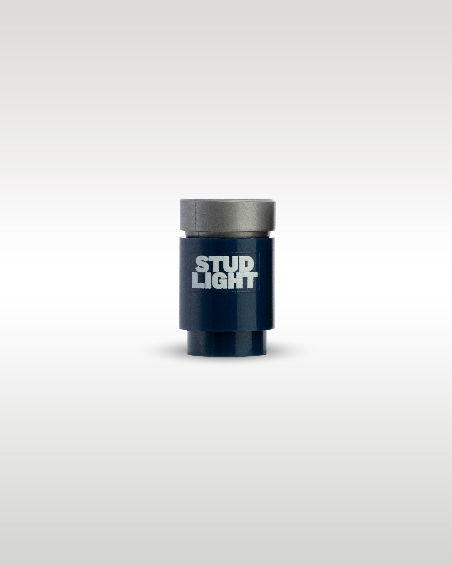 Custom printed Stud Light beer can accessory by Trader Bricks, featuring a bold white parody logo on a dark blue 1x1 round brick for Lego minifigures