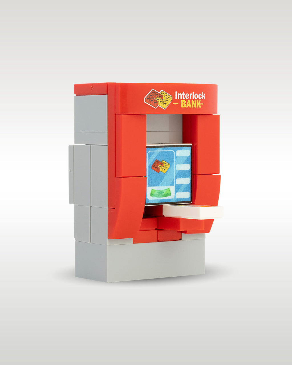 Side profile view of a custom brick-built Interlock Bank ATM machine for Lego city layouts, showcasing the mechanical cash-dispensing slot