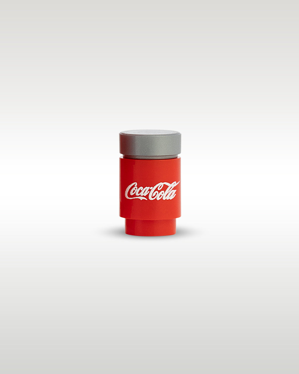 Front close-up view of the custom printed miniature Coca-Cola soda can accessory by Trader Bricks, featuring the classic red and white script logo on a 1x1 round brick