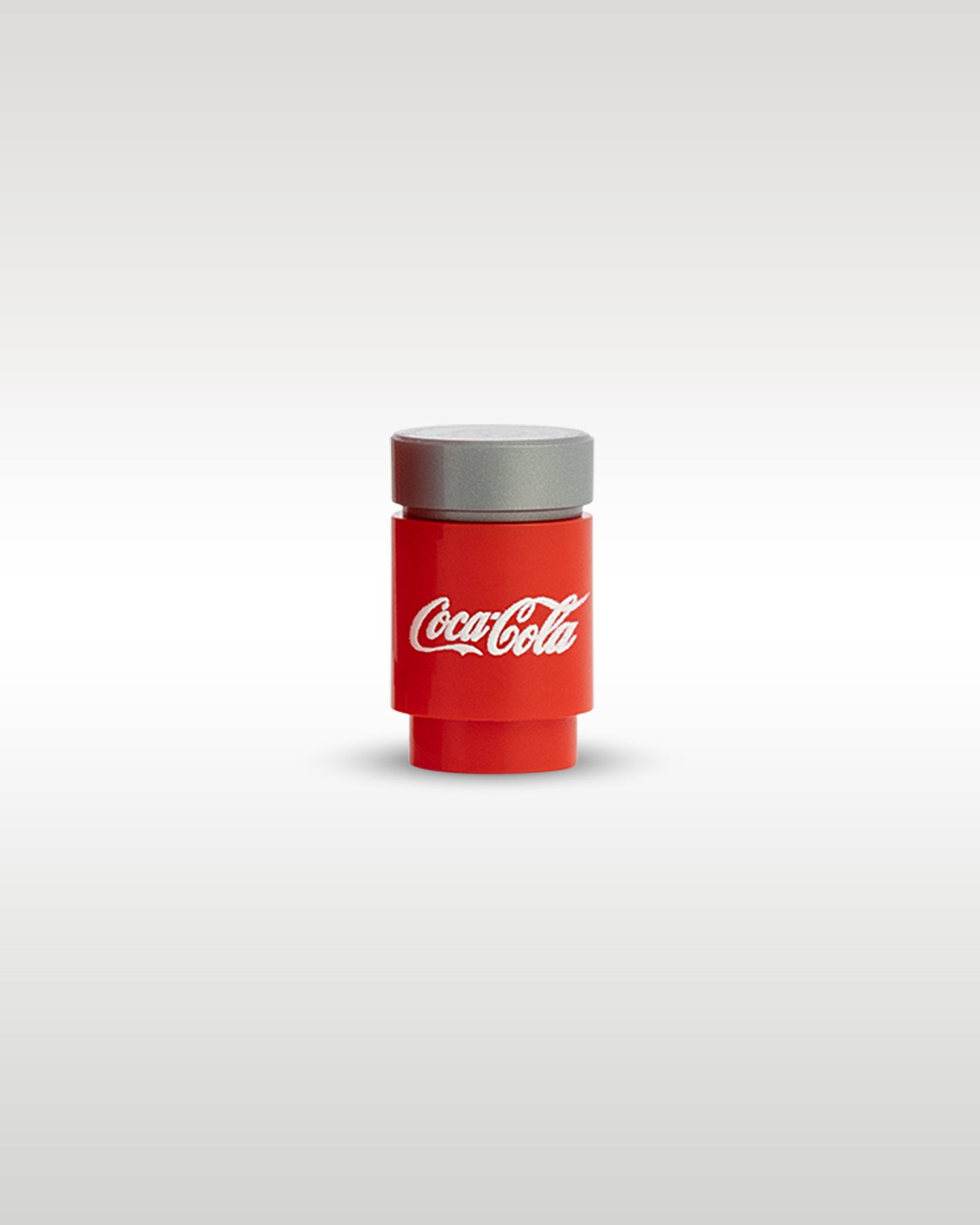 Front close-up view of the custom printed miniature Coca-Cola soda can accessory by Trader Bricks, featuring the classic red and white script logo on a 1x1 round brick
