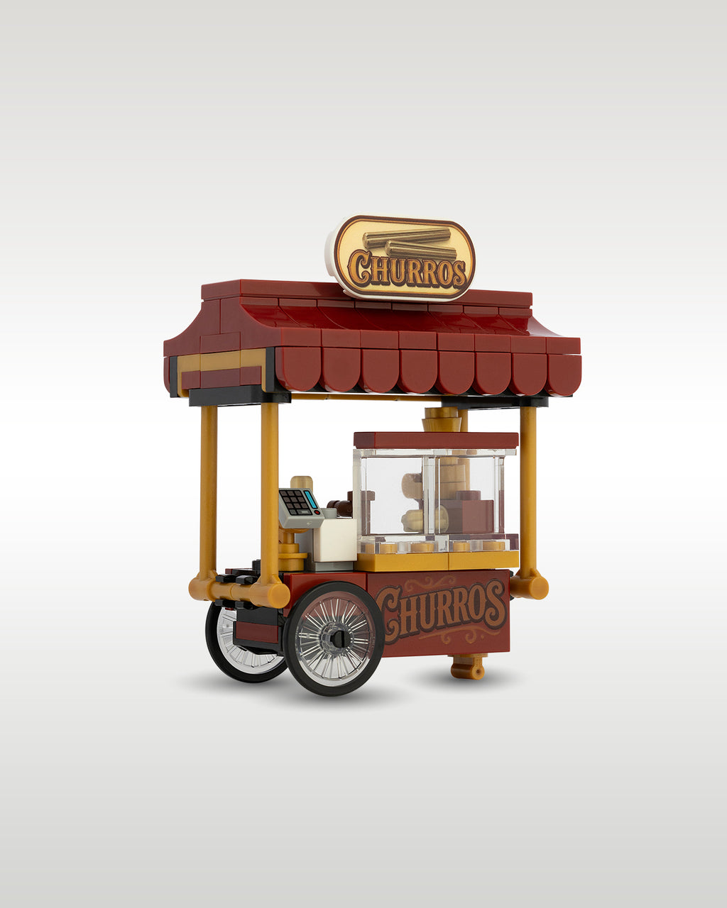 Side perspective of the modular theme park churro cart build, showcasing the compact scale designed to fit standard brick city sidewalks